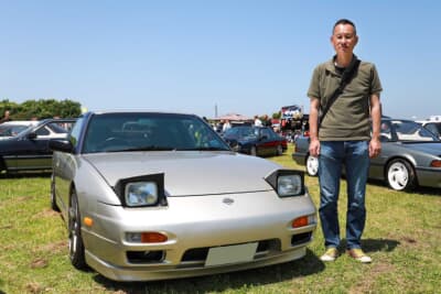 1993年式の日産 180SX タイプ3とオーナーの“ダイスケ”さん。もう1人のオーナーの息子さんは今回イベント不参加だった