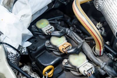 ダイハツ エッセ：社外品の強化コイルに交換するドライバーが多い中、中田は信頼性を優先し純正を使う