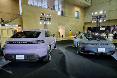 日本では発表されたばかりの新型「マカン」と、同じソリッドグレーにペイントされた「911GTS」が並ぶ