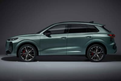 アウディ Q3：サイドは水平基調のショルダーラインによって上下2分割され、光と影のコントラストを強調している