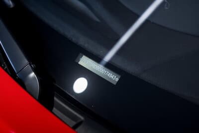 80万スイスフラン〜90万スイスフラン(邦貨換算約1億4800万円〜約1億6700万円)で現在も販売中のフェラーリ「599 GTO」(C)Bonhams|Cars