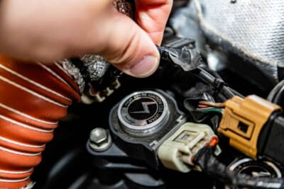 ダイハツ エッセ：電装系はリフレッシュを兼ねて社外品のハイスパークイグニッションコイルを使っている