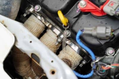 スバル プレオ：1クラスではエキマニの交換も認められている。高回転域を重視するなら4-1タイプ、下のトルクが欲しければ4-2-1タイプを選ぼう