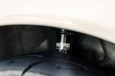 日産 マーチR:デッドストックで入手したNISMOラリー用ショックアブソーバ。品番「54302-RS259」のラベルがそのまま残る